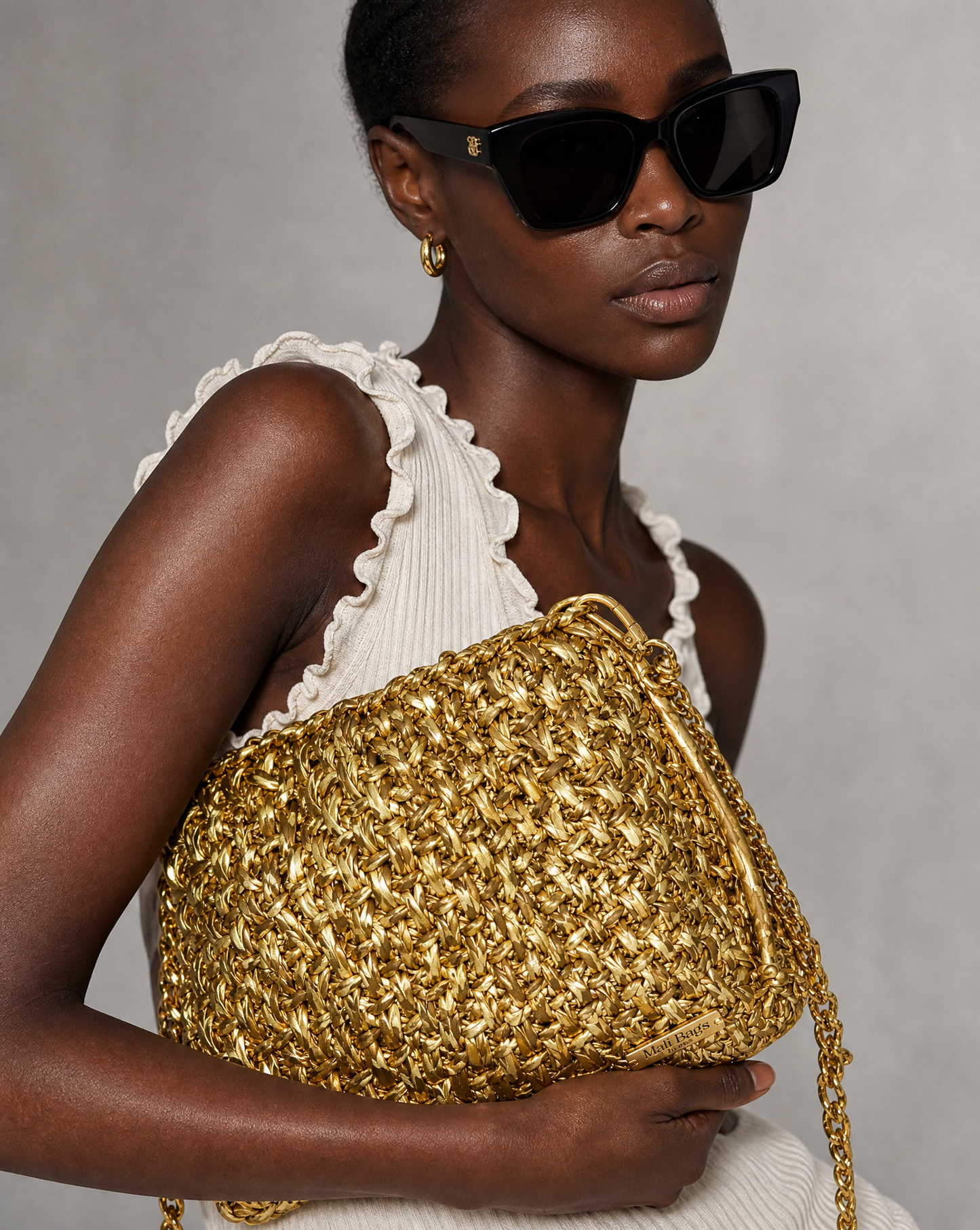 Carol pouch bag in Gold