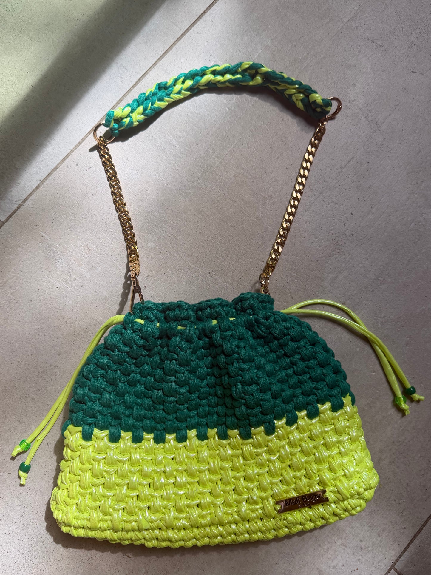 Carol green & neon lime green pouch bag