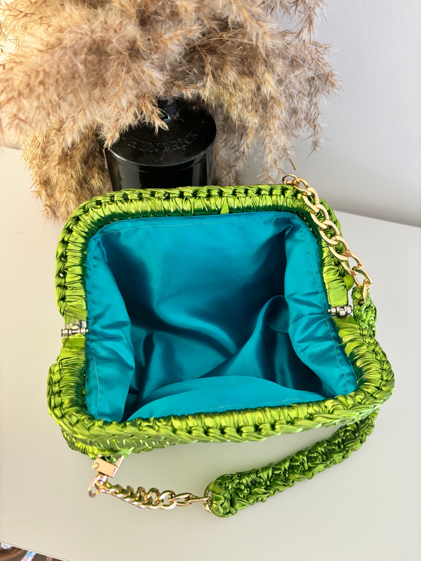 Gretta Metallic green premium yarn Clutch